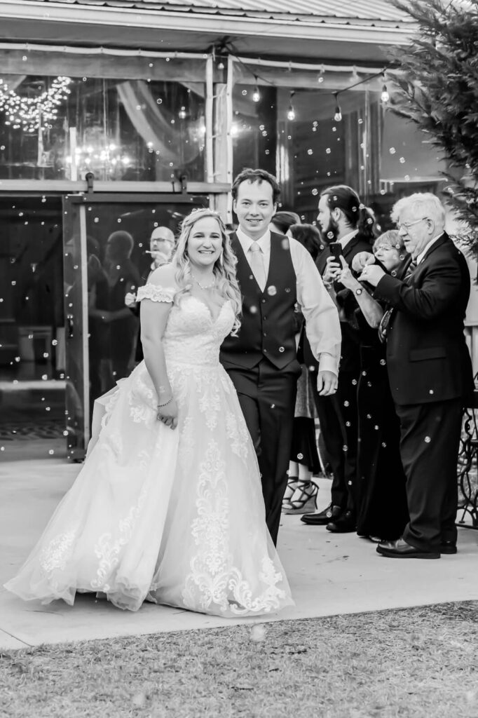 Jackson's Landing Wedding Bride and Groom exiting reception